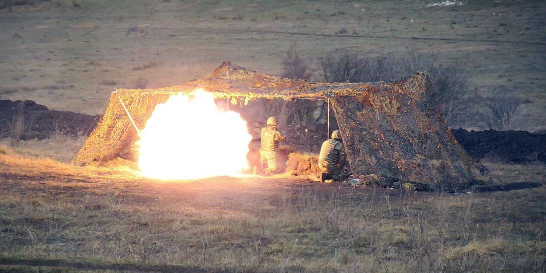 Soldiers participate in NATO’s multinational live-fire exercise Scorpions Fury 2018 in Romania last November. The alliance has declared cyberspace to be an operational domain on a par with land, sea and air, but it still must develop a policy to integrate cyber operationally with the kinetic effect domains. NATO photo