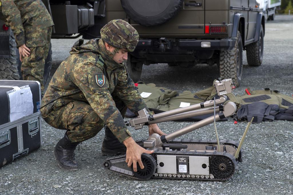 A Bulgarian soldier prepares an unmanned ground vehicle for operations during Trident Juncture 2018. This multinational exercise included an information environment assessment that used artificial intelligence and autonomous systems to help participants survey the battlefield.  ACT photo