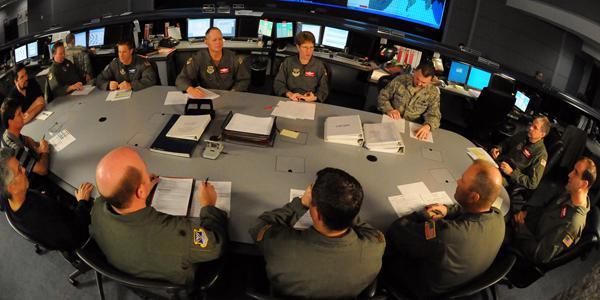 Personnel with the 618th Tanker Airlift Control Center coordinate global operations from Scott Air Force Base, Illinois. The U.S. Transportation Command (TRANSCOM) finds itself amid battles in cyberspace as intrusions on networks owned by its commercial partners pose a significant threat to U.S. military operations.