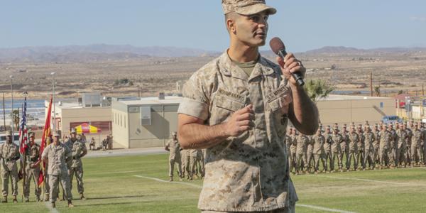Lt. Col. Speros C. Koumparakis, USMC, commanding officer of the communication training battalion (CTB) in the Marine Corps Communication-Electronics School (MCCES), addresses the audience during the CTB’s activation ceremony in March. The CTB, along with the air control training squadron (ACTS), have been consolidated under the MCCES at a single facility in Twentynine Palms, California.