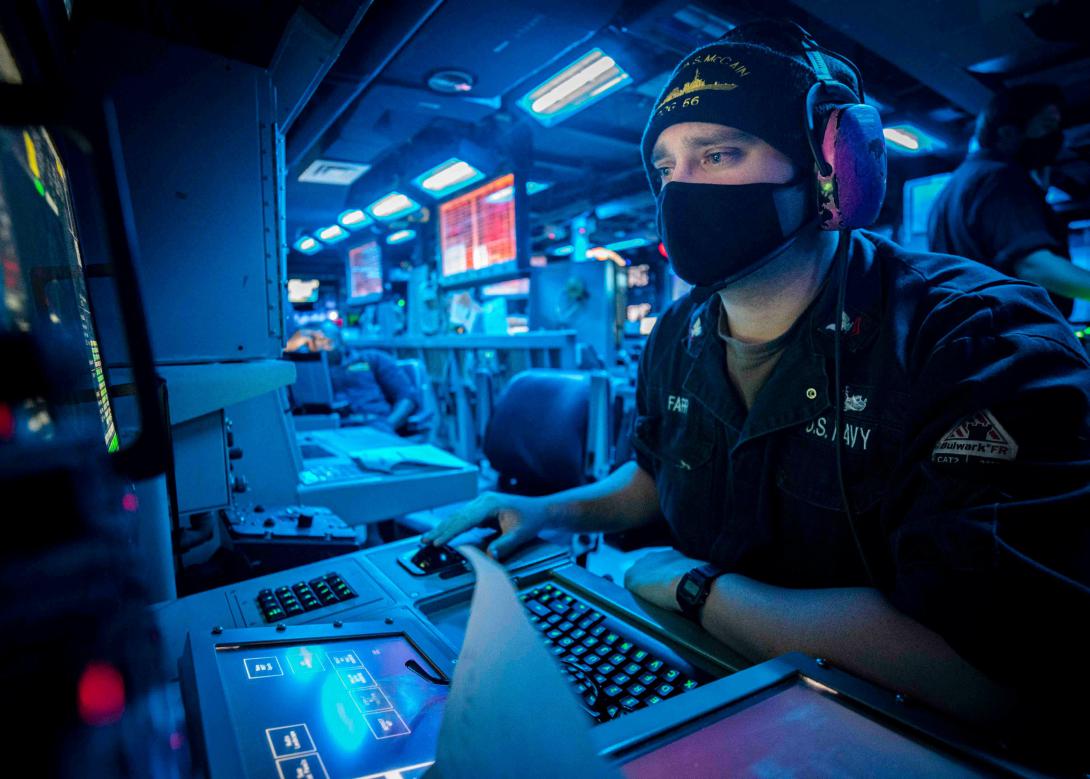A sonar technician simulates counterfire during an antisubmarine warfare drill aboard the Arleigh Burke-class guided missile destroyer USS John S. McCain. The Navy is exploring advances in machine learning and artificial intelligence to deal with the rapidly increasing amount of sensor data flooding naval intelligence systems.  U.S. Navy photo