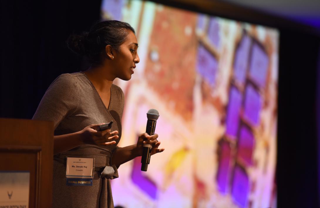 Devaki Raj, CEO and founder, CrowdAI, pitches her product to small businesses, venture capitalists and airmen during the Inaugural Air Force Pitch Day. Raj was awarded a same-day contract. The Air Force is partnering with small businesses to help further national security in air, space and cyberspace. (U.S. Air Force photo by Tech Sgt. Anthony Nelson Jr.)