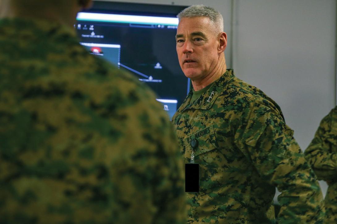 Lt. Gen. Brian D. Beaudreault, USMC, commanding general, II Marine Expeditionary Force, receives a brief during the end of Cyber Fury 2020 at Camp Lejeune, North Carolina. Cyber Fury is an annual training exercise that allows Marines to simulate a series of cyberspace attacks by identifying and countering them. Credit: Lance Cpl. Haley McMenamin, USMC