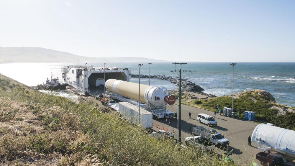 A United Launch Alliance barge delivering the Delta IV Heavy rocket boosters docks at Vandenberg Air Force Base, California on April 5; and (above) the boosters are offloaded on May 4. Commercial launch operations will be a key part of the Space Development Agency’s mission. U.S. Air Force photo by Senior Airman Aubree Owens