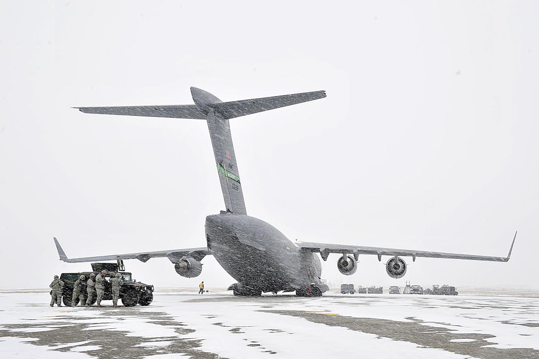 Snow falls and reduces visibility at Minot Air Force Base in North Dakota during a large-scale inspection for all operations held at the base.