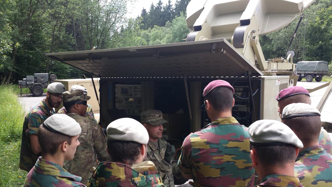 U.S. and Belgian signaleers troubleshoot interoperability issues.