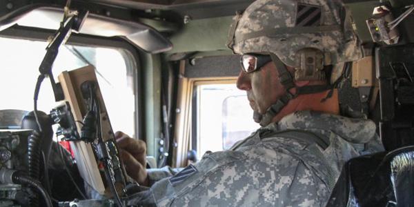 Command Sgt. Maj. Alan Hummel, USA, senior enlisted adviser for the 4th Infantry Brigade Combat Team, 3rd Infantry Division, uses a Joint Battle Command-Platform system to navigate to his unit’s training on the Blue Force Tracking technology.
