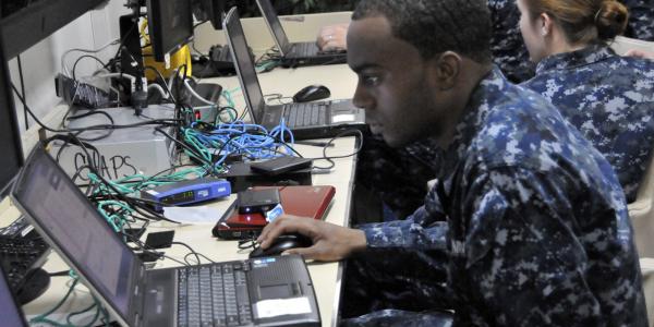 A U.S. sailor aboard the amphibious assault ship USS Boxer sets up a virtual server administrator account during a training course provided by the Space and Naval Warfare Systems (SPAWAR) Command. The command furnishes fleets with fly-away network operations support teams that offer tailored, hands-on information technology and information assurance training to maintain command, control, communications and computers readiness.