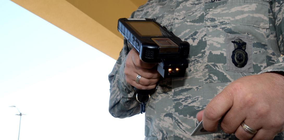 The U.S. Defense Department uses the new Defense Biometric Identification System, a card-scanning device that relies on bar codes and biometrics to identify individuals. Photo by Senior Airman Alexa Culbert, USAF