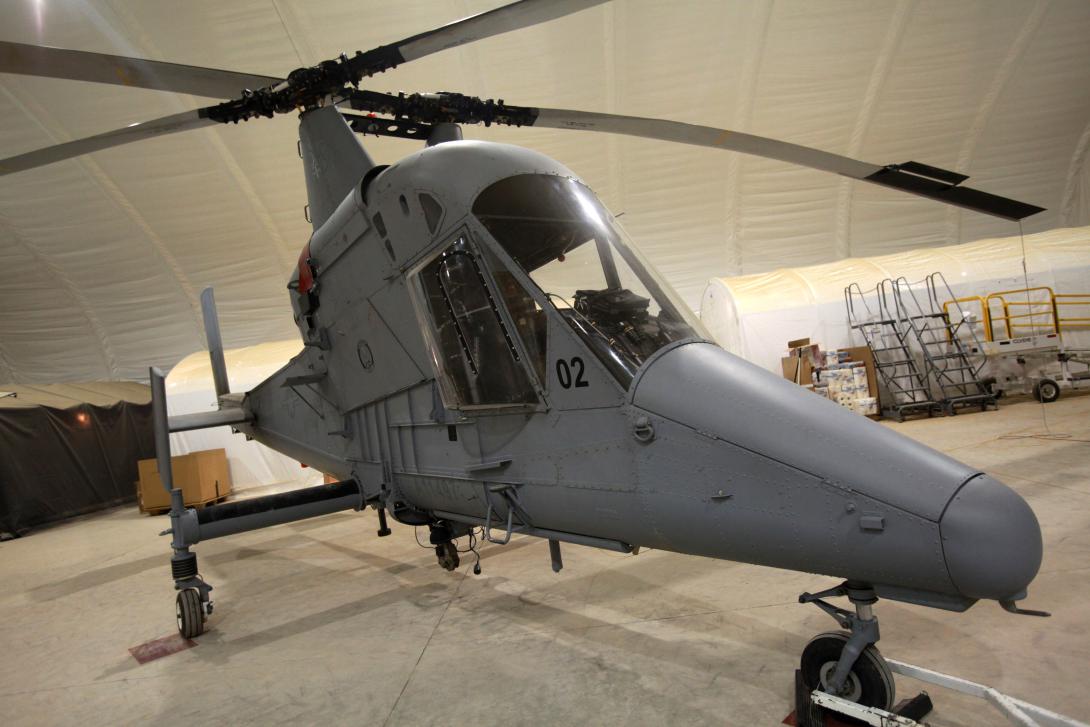 A K-MAX helicopter with U.S. Marine Corps Unmanned Aerial Vehicle Squadron 1 rests in a hangar in Helmand province, Afghanistan, in 2012. It was used for logistical missions in the combat zone.