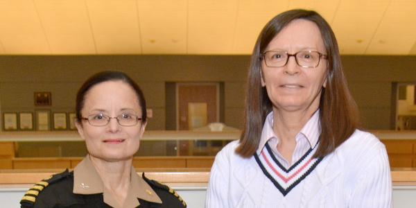 Capt. Epstein (l) and Eileen Villasante, head of the NMRC’s Malaria Research Department, are developing a vaccine for the top infectious disease affecting troops. Photo courtesy Naval Medical Research Center