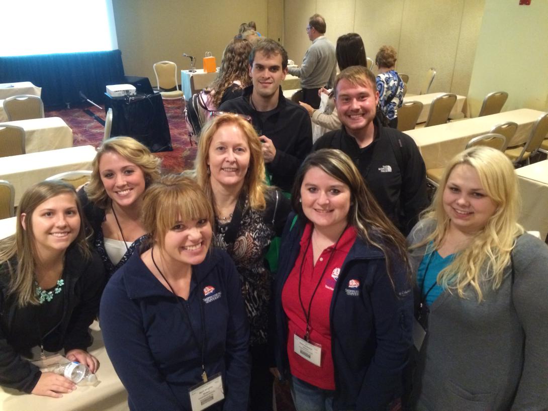 Future middle school science teachers take a moment out of attending the National Science Teachers Association Regional Conference in Philadelphia as part of a networking opportunity to meet with current science educators, exhibitors and future colleagues.