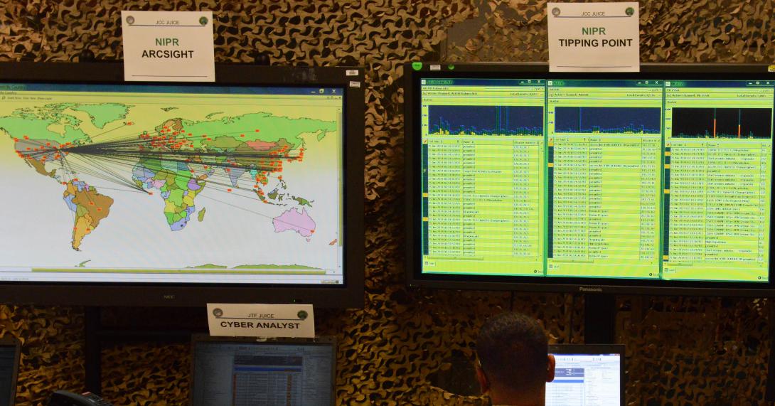 A soldier monitors computer screens during a Joint Users Interoperability Communications Exercise, or JUICE, annual event. JUICE includes network planning, systems integration, network operations and computer network defense to identify ways to improve operational capabilities.