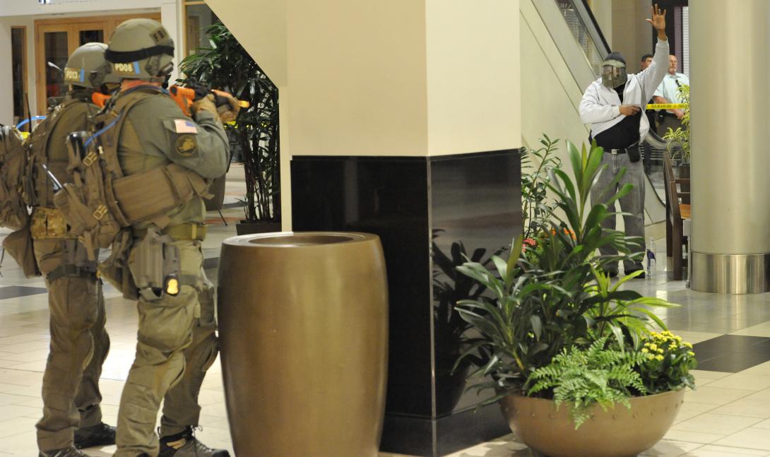 The FBI’s Portland, Oregon, SWAT team participates in a threat response exercise in 2014 at Washington Square shopping mall. More and more businesses must contend with the growing cluster of terror, cyber and insider threats.