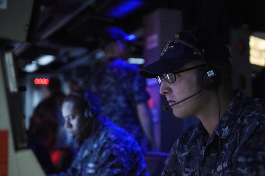 A U.S. sailor aboard the guided-missile destroyer USS Michael Murphy participates in an Office of Naval Research demonstration of improved training programs that combine software and gaming technology to help naval forces plan diverse missions and operations. Sailors learn to interact with artificially intelligent forces in a number of virtual settings and train for multiple missions simultaneously.