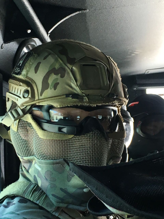 A police SWAT team member gears up to test augmented reality glasses during Urban Shield, an annual first responder exercise and weapons exhibition in Northern California. The smart eyewear, a creation of Mutualink and Intel’s Recon Jet, provide situational awareness to users via information transmitted to the corner of the glasses.