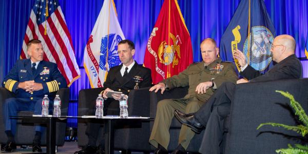 Service chiefs (l-r) from the U.S. Coast Guard, Navy and Marine Corps discuss critical issues they are confronting. Photo by Michael Carpenter