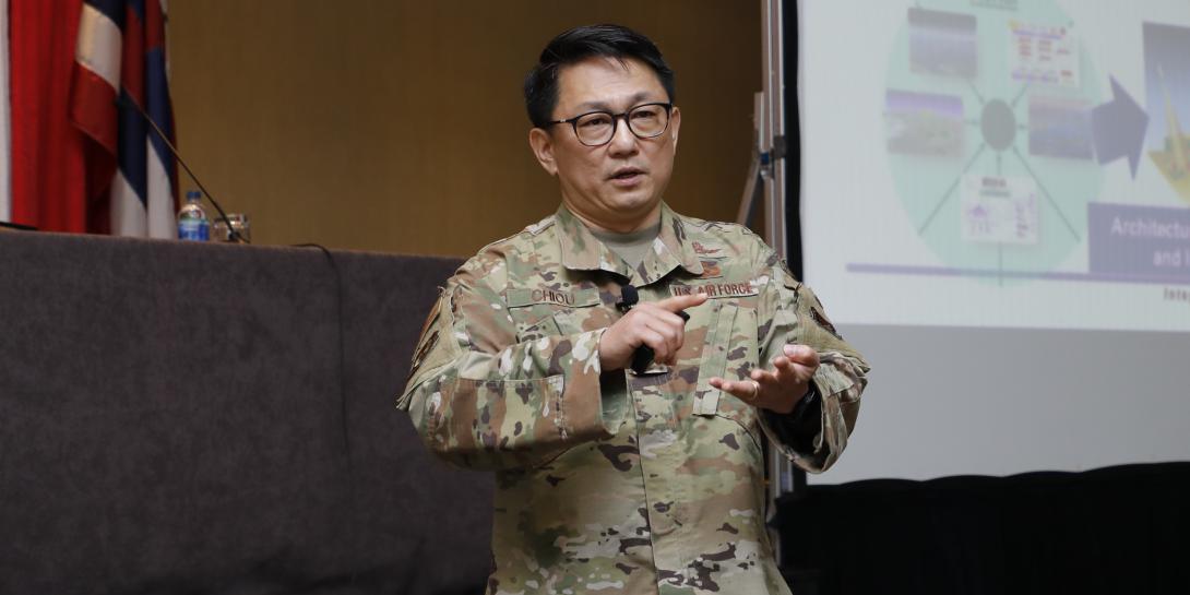 Col. Peter “STIX” Chiou, USAF, chief of Integrated Warfighting Networks, Air Force Chief Architect Office, describes the new Integrated Warfighting Network at a briefing at TechNet Indo-Pacific. Credit: Tony Grillo photo