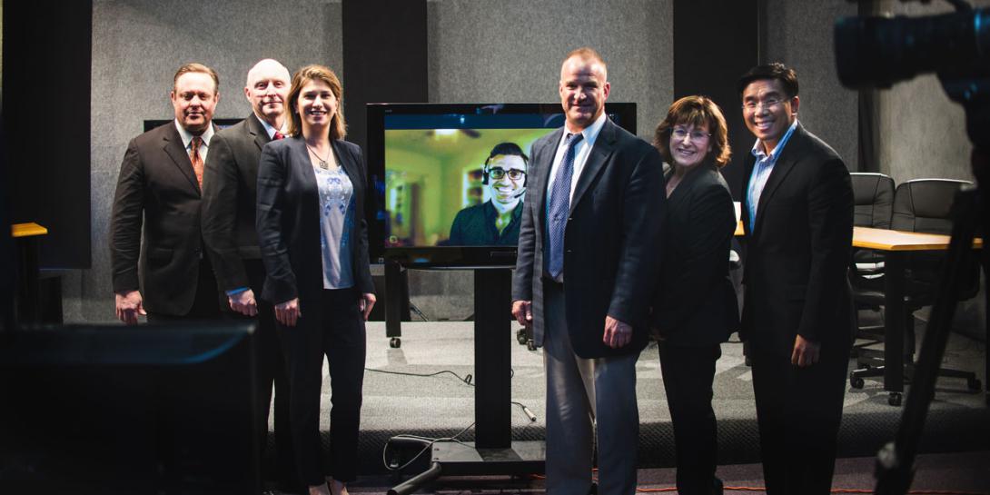 Judges and competitors gather at the penultimate AFCEA innovation shark tank, held on February 26. Photo by Elizabeth Moon