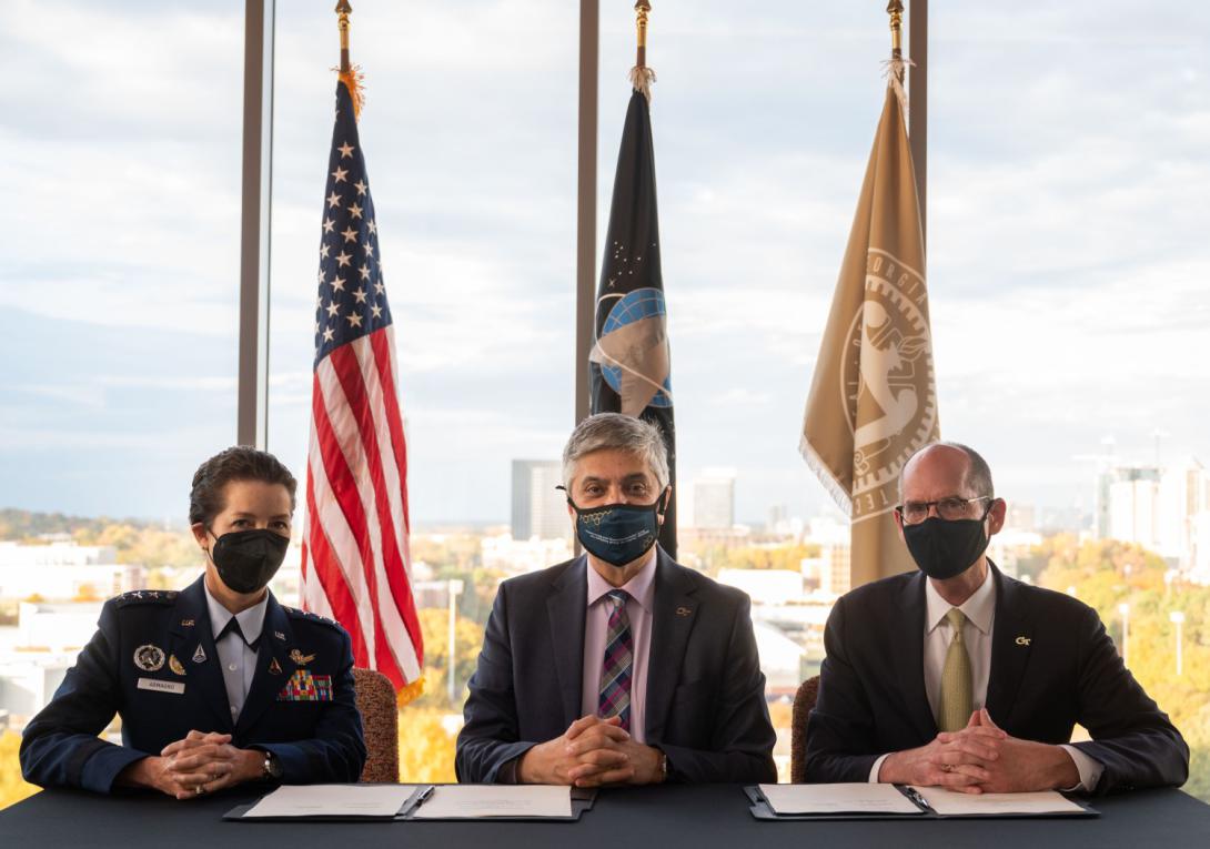 Lt. Gen. Nina Armagno, USAF (l), U.S. Space Force director of staff, with Georgia Institute of Technology Executive Vice President for Research Chaouki Abdallah (c) and Provost Steven McLaughlin, signed a memorandum of understanding November 11 at Georgia Tech as part of the Space Force’s university partnership program. Credit: Allison Carter, Georgia Tech
