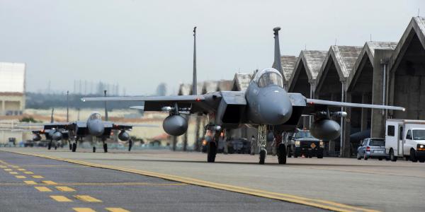 U.S. Air Force F-15 Eagles flying for the U.S. Pacific Command taxi near a runway at Kadena Air Base, Okinawa, Japan. North Korean hackers stole wing designs for the F-15 from a South Korean company in a series of cyber attacks over a two-year period.