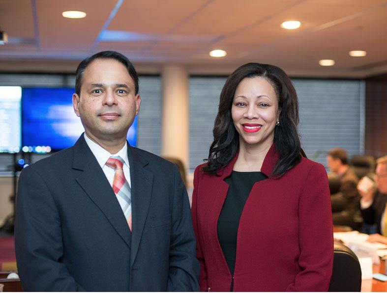 Carla Thomas, DHS industry liaison, shares some of the many ways the DHS works with industry during a briefing of the AFCEA Small Business and Homeland Security committees. She is seen here with Small Business Committee Chairman Sukumar Iyer. 