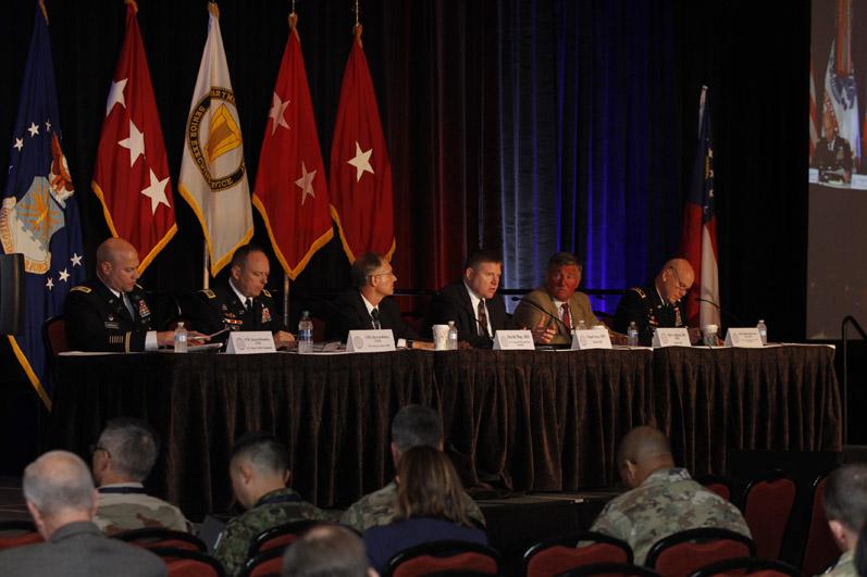 Maj. Gen. John Morrison Jr., USA, commanding general of the Army Cyber Center of Excellence (far r), moderates a panel at the AFCEA TechNet Augusta conference. Photo by Michael Carpenter
