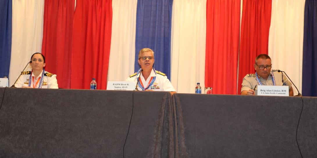 Panelists (l-r) Cmdr. Kathryn McCabe, RAN, vice director for C4, INDOPACOM; Rear Adm. Brett R. Sonter, RAN, deputy director, Maritime Operations-Australia, U.S. Pacific Fleet; and Brig. Gen. Alan Lister, RM, J-5 deputy director for policy, INDOPACOM, discuss coalition operations at TechNet Indo-Pacific. Credit: Dave Livingston photo