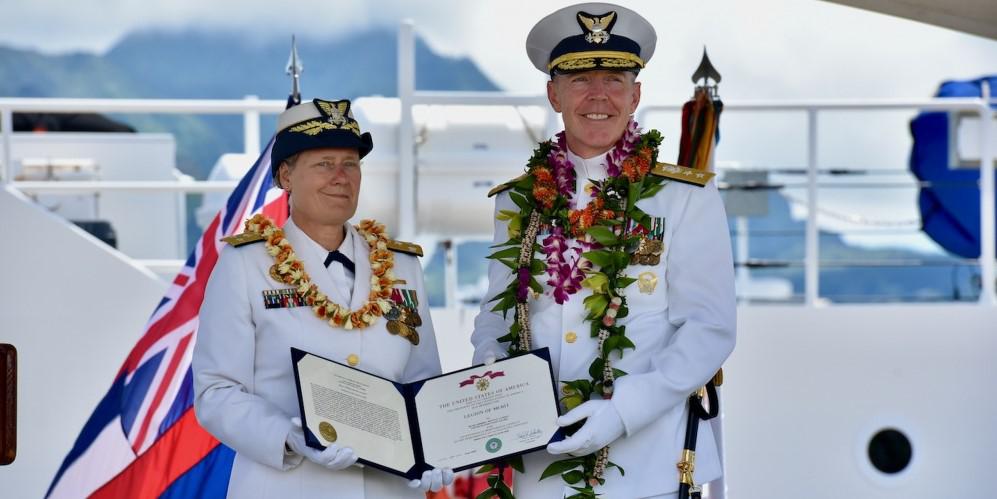 The U.S. Coast Guard is facing additional challenges, especially in the Pacific, says Vice Adm. Linda Fagan (l), USCG, Coast Guard Pacific Area commander, pictured presenting Rear Adm. Kevin Lunday, commander, Coast Guard 14th District, with a Legion of Merit award during a ceremony on the U.S. Coast Guard Base Honolulu, Hawaii, in June 2020. Credit: U.S. Coast Guard photo by Chief Petty Officer Sara Muir