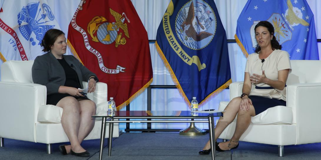 Michelle Lee, director, Threat Intelligence at Lumen Technologies (l) and Caroline Kuharske, acting chief data officer, Defense Information Systems Agency, converse during a sesison at AFCEA’s TechNet Cyber 2022. Photo by Michael Carpenter
