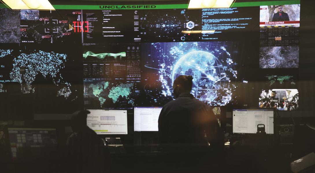 U.S. Cyber Command members work in the Integrated Cyber Center, Joint Operations Center, at Fort George G. Meade, Maryland in April.  Photo by Josef Cole, U.S. Cyber Command