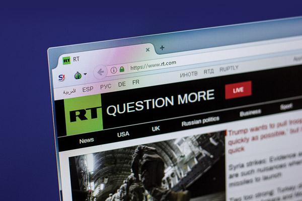RT, an international television network funded by the Russian government, encourages viewers to be skeptical about the information they read. Credit: Sharaf Maksumov/Shutterstock.com