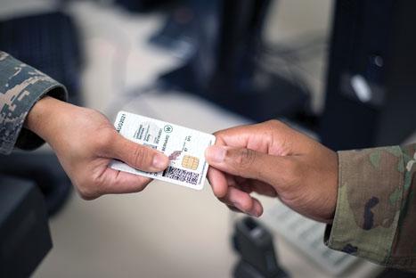  The 6th Force Support Squadron military personnel flight assists customers with common access cards (CAC), dependent IDs, reserve IDs, retiree IDs and Defense Enrollment Eligibility Reporting System (DEERS) updates at the DEERS and ID Cards office at MacDill Air Force Base in Florida. Credit: Airman 1st Class Scott Warner, USAF
