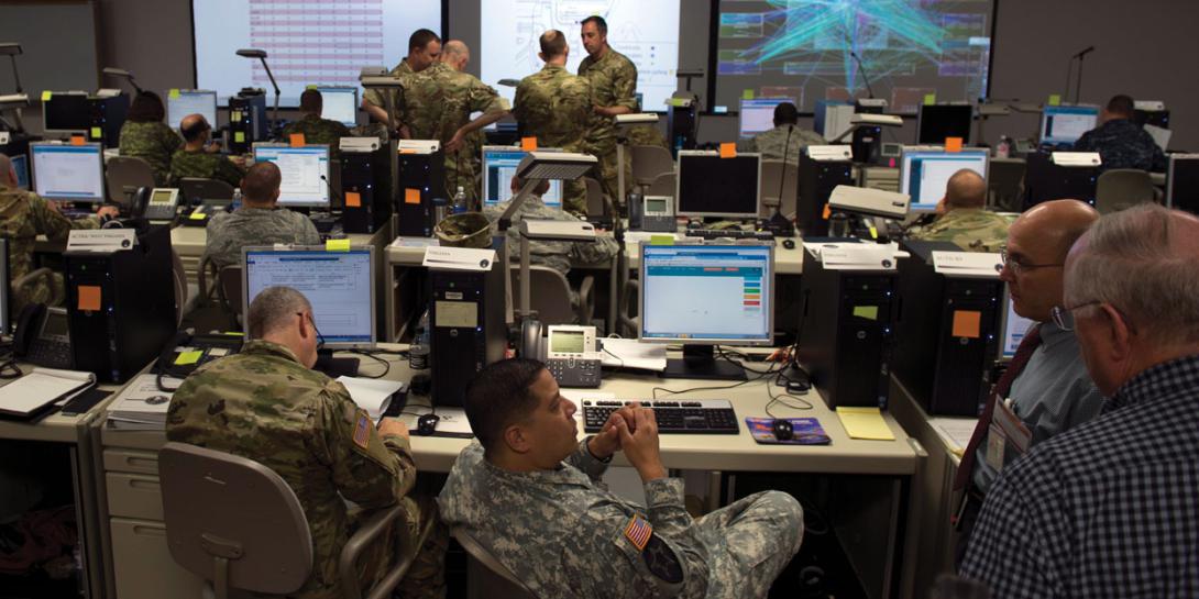 As part of the nine-day Cyber Guard exercise, participants work through a training scenario. Credit: Navy Petty Officer 2nd Class Jesse A. Hyatt, USN