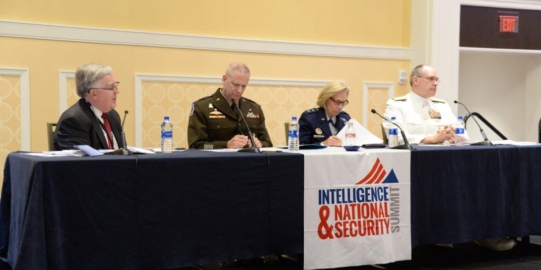Panelists discussing military service intelligence priorities at the AFCEA/INSA Intelligence & National Security Summit are (l-r) panel moderator Lt. Gen. Robert Noonan, USA (Ret.); Lt. Gen. Scott Berrier, USA;  Lt. Gen. Veralinn “Dash” Jamieson, USAF; and Rear Adm. Steve Parode, USN. Credit: Herman Farrer Photography