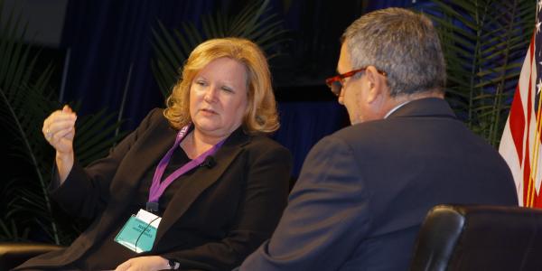 Acting federal Chief Information Officer Margie Graves and Alfred Rivera, director of DISA's Development and the Business center, discuss cyber at AFCEA's Defensive Cyber Operations Symposium. 