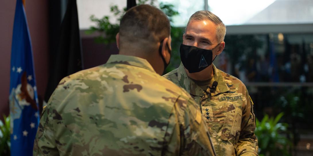 Lt. Gen. Stephen Whiting, Space Operations Command commander, shown inducting a service member into the U.S. Space Force, discussed cyber defense advancements at the 2022 Rocky Mountain Cyberspace Symposium. Credit: U.S. Space Force photo by Staff Sgt. Kirsten Brandes