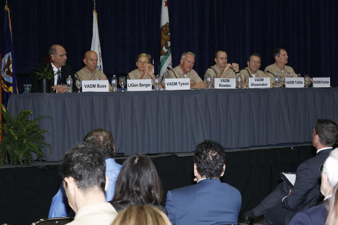 Panelists discussing how to implement the strategy are (l-r) moderator Vice Adm. David H. Buss, USN (Ret.); Lt. Gen. David H. Berger, USMC, I MEF; Vice Adm. Nora W. Tyson, USN, Third Fleet; Vice Adm. Thomas S. Rowden, USN, Naval Surface Forces; Vice Adm. Mike Shoemaker, USN, Naval Air Forces; Vice Adm. Joseph E. Tofalo, USN, Naval Submarine Forces; and Rear Adm. Matthew Kohler, USN, Naval Information Forces.