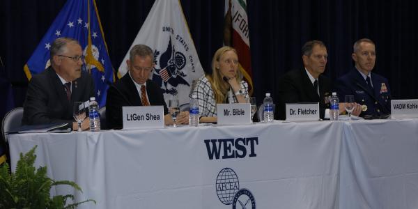 Panelists discussing how to use the network to build maritime power are (l-r) moderator Lt. Gen. Robert Shea, USMC (Ret.), AFCEA president and CEO; Kenneth W. Bible, deputy director, C4/Deputy CIO, U.S. Marine Corps; Kelly Fletcher, acting Department of Navy CIO; Vice Adm. Matthew J. Kohler, USN, commander, Naval Information Forces; and Rear Adm. Kevin Lunday, USCG, assistant commandant, C4&IT and commander, U.S. Coast Guard Cyber Command.