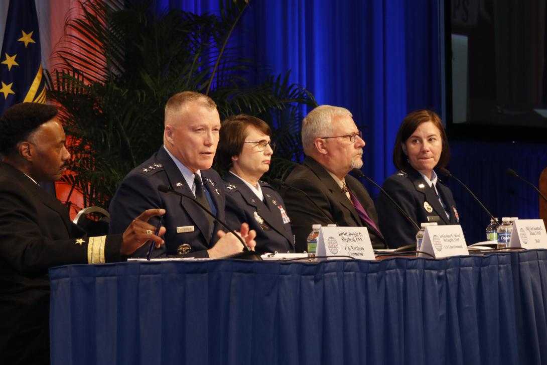 Discussing cooperative cybersecurity efforts are (l-r) Rear Adm. Dwight D. Shepherd, USN, NORAD/NORTHCOM; Lt. Gen. Kevin McLaughlin, USAF, U.S. Cyber Command; Maj. Gen. Sandra E. Finan, USAF, U.S. Defense Department; Dean S. Betzer, U.S. Special Operations Command; and moderator Maj. Gen. Sarah E. Zabel, USAF, DISA.