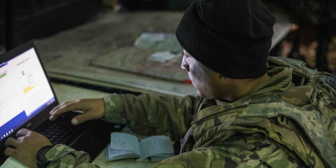 Warrant Officer Alan Mendoza, USA, an all-source intelligence technician assigned to the 2nd Battalion, 34th Armored Regiment, 1st Armored Brigade Combat Team, reviews significant activity during exercise Allied Spirit X in Hohenfels, Germany. The exercise included participants from 15 nations, enabling U.S. military participants to evaluate communications interoperability. (Photo Credit: Sgt. Thomas Mort, USA)
