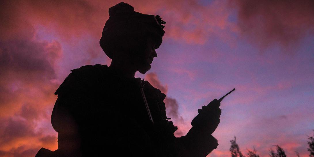 A Marine uses a radio during a field exercise at Camp Hansen in Okinawa, Japan, in 2017. A resilient network is a key component for the Joint All-Domain Command and Control (JADC2) concept. The Pentagon is developing a strategy to enable JADC2. Credit: Marine Corps photo by Cpl. Carl King