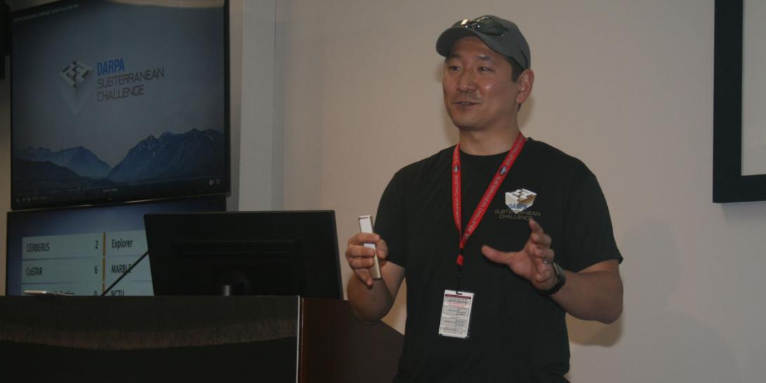 Timothy Chung, program manager, Tactical Technology Office, Defense Advanced Research Projects Agency (DARPA), briefs SIGNAL Magazine and other reporters on August 20 during DARPA's Subterranean Challenge at a coal mine research facility in Pittsburgh.
