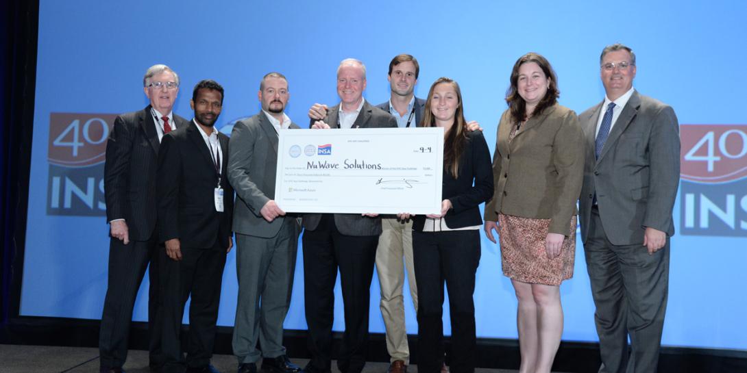 NuWave Solutions was selected as the winner of the 2019 Intelligence and National Security Summit EPIC App Challenge. The team participated in a competition to extract data from open source websites and applications, enrich it to make it more useful, build a model to triage reporting and identify news reported by the media containing viable intelligence. (Photo by Herman Farrer)