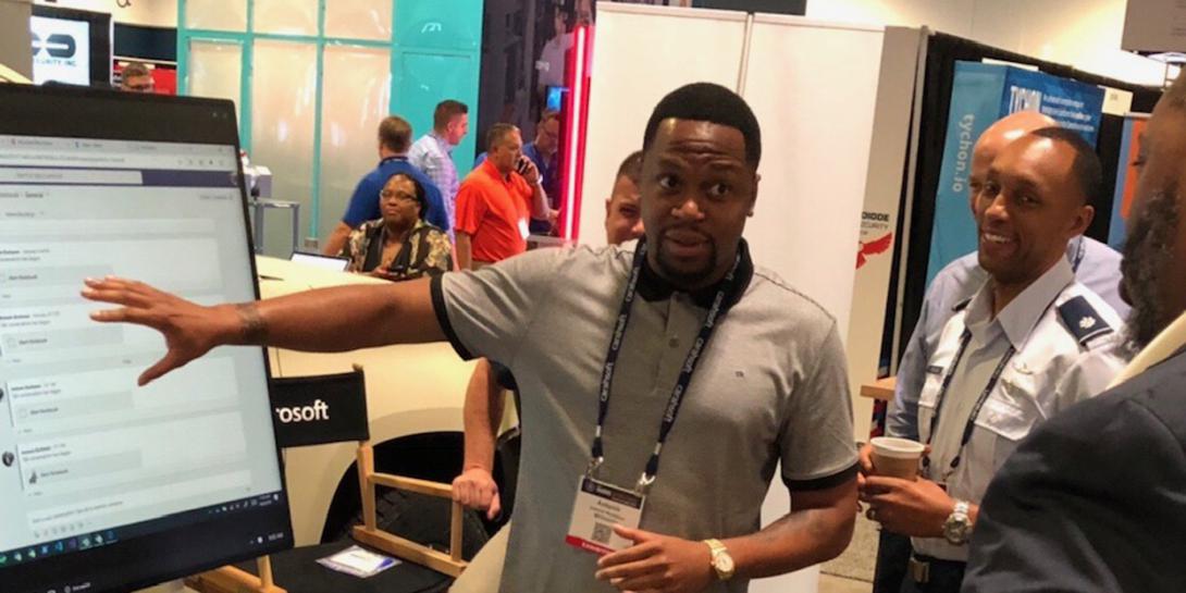 Antonio Buchanan, account technology strategist, explains Azure analysis capabilities, integrated with Microsoft Teams at the Department of Defense Intelligence Information Systems conference. (Photo courtesy by Microsoft Corporation)