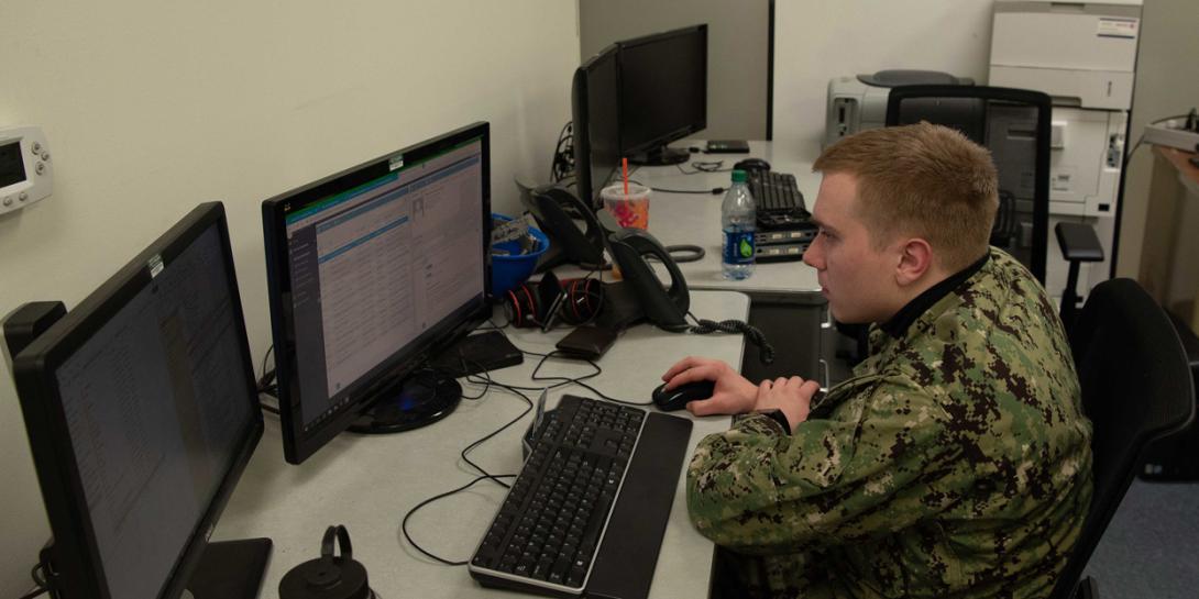 A U.S. Navy information systems technician works on a computer in a Carrier Vessel Nuclear Information Technology space. The Navy is incorporating the mechanism in its new information systems contract to provide capability upgrades on the fly. Photo Credit: U.S. Navy