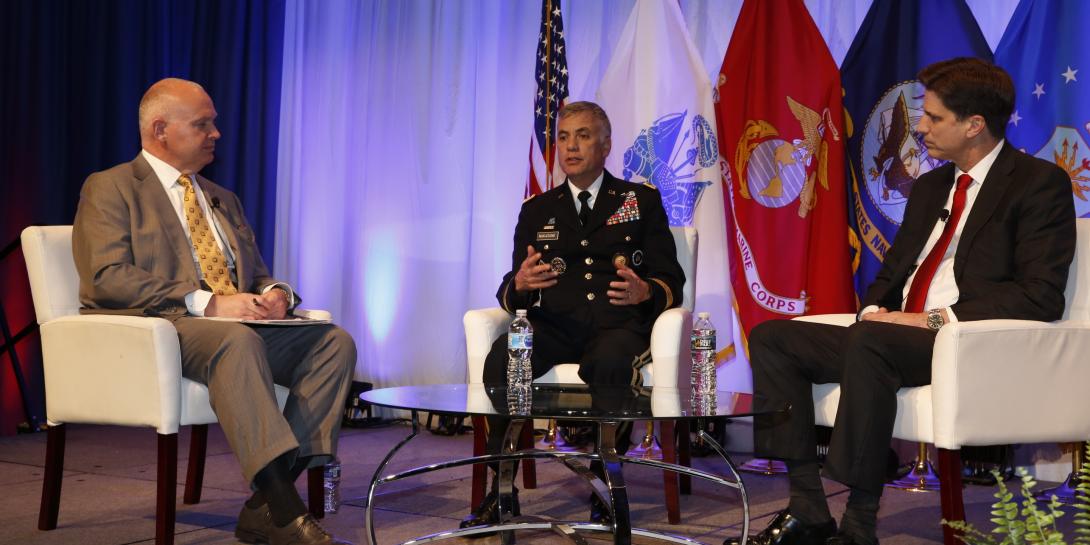 From l-r, Francis Rose of Government Matters moderates a fireside chat with Gen. Paul Nakasone, USA, director of the NSA and commander of U.S. Cyber Command, and Dana Deasy, Defense Department CIO, at TechNet Cyber. Photo by Michael Carpenter