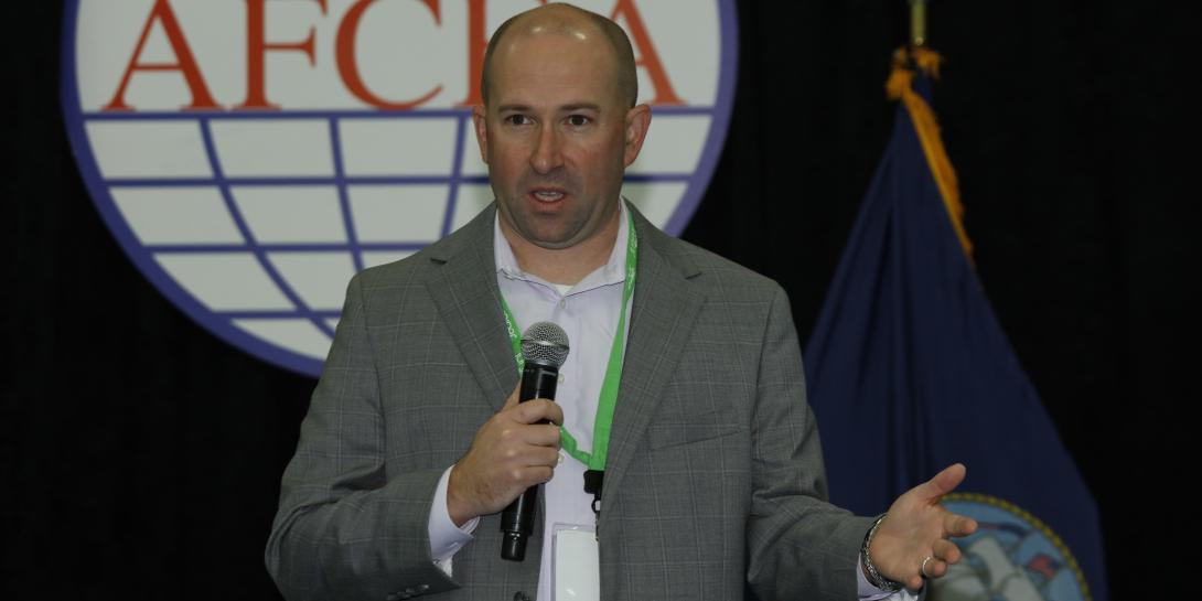 Stephen Wallace, DISA’s chief technology officer and director of the agency’s Emerging Technologies Directorate, addresses TechNet Cyber in Baltimore. Photo by Michael Carpenter