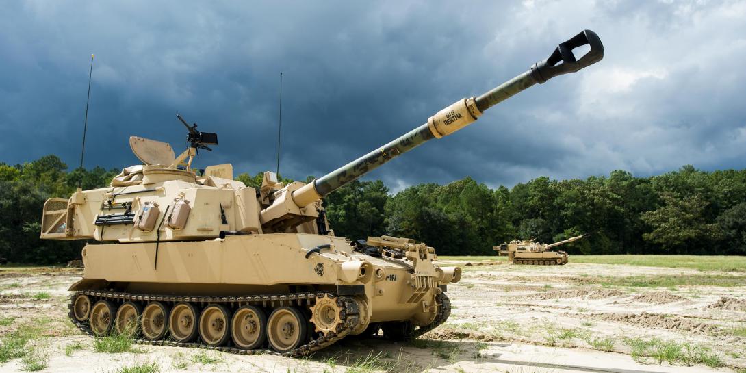 M109A6 Paladin self-propelled howitzers from Battery B, 1st Battalion, 9th Field Artillery Regiment “Battlekings,” 2nd Armored Brigade Combat Team, 3rd Infantry Division, sit ready to fire at Fort Stewart, Georgia, September 11, 2014. Credit: U.S. Army/Staff Sgt. Richard Wrigley