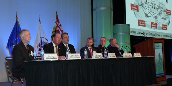 Panelists discuss modernizing U.S. military networks at MILCOM 2016. Photo by Mike Carpenter